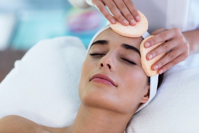 Woman Getting Facial Treatment